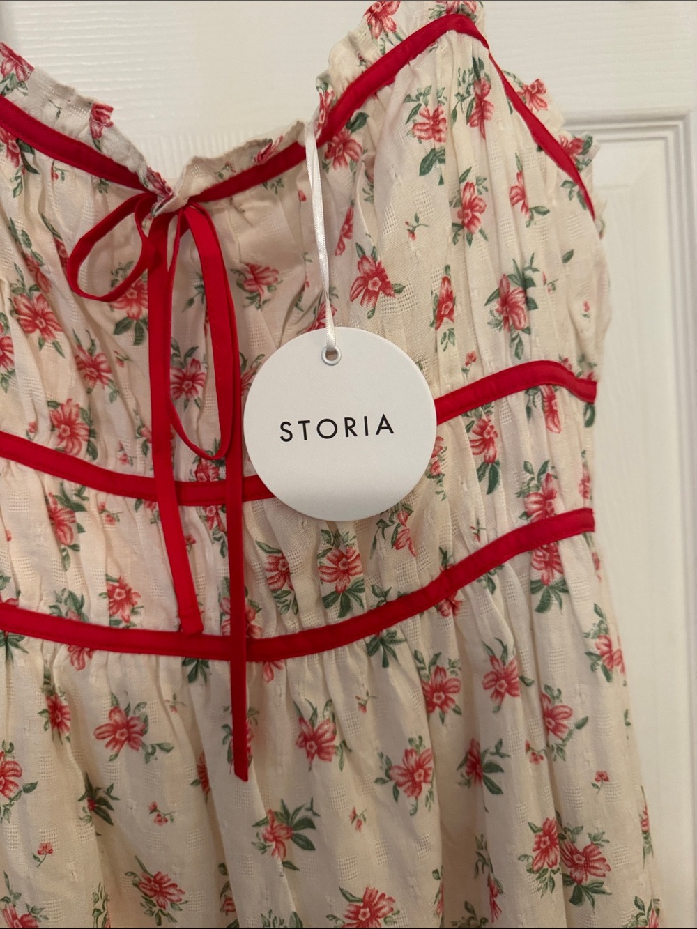 Storia Cream and Floral Print Textured Dress with Red Bow Detail - Picture 3 of 9